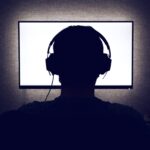 Man in front of a blank monitor